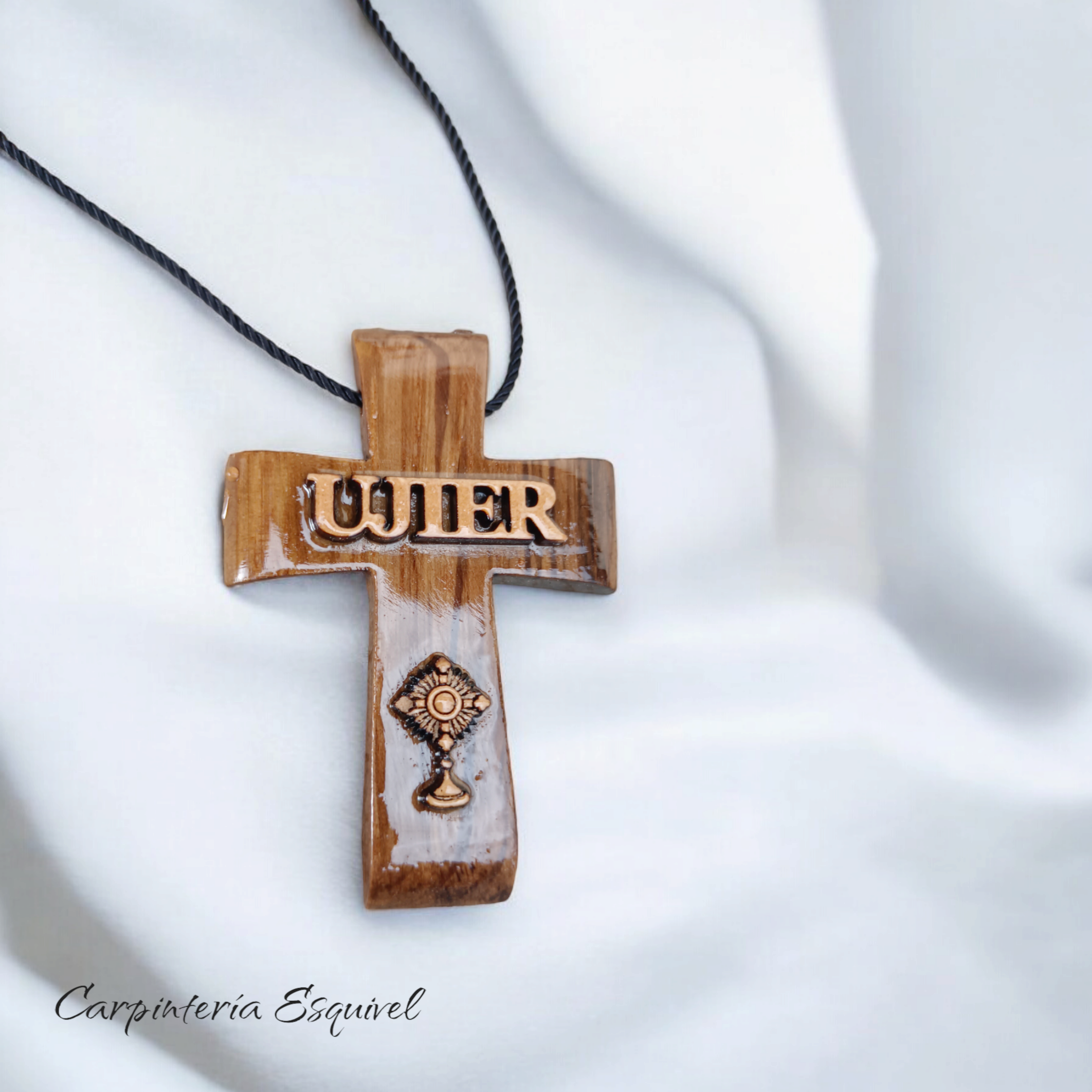 Cruz para Ujier